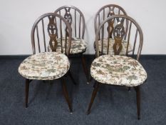 A set of four Ercol dining chairs