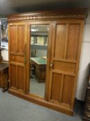 A Victorian mahogany triple door wardrobe,