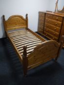 A contemporary pine 3' bed frame