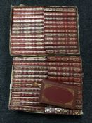 Two boxes of leather bound Heron books and novels