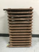 An antique fourteen bar cast iron radiator