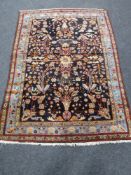 An antique Persian Faraghan rug,