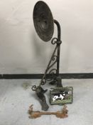 An antique cast iron street light bracket, formerly from Stanhope Police Station, Weardale,