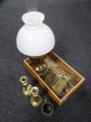 A pair of brass candlesticks, brass oil lamp,