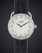 A LADIES STAINLESS STEEL & DIAMOND HERMES ARCEAU WRIST WATCH CIRCA 2000s, REF. AR5.730 WITH ORIGINAL