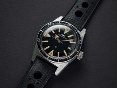 A VERY RARE GENTLEMAN'S STAINLESS STEEL JAQUET DROZ 25 