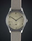 A RARE GENTLEMAN'S LARGE SIZE STAINLESS STEEL LONGINES 
