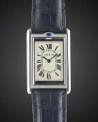 A GENTLEMAN'S STAINLESS STEEL CARTIER TANK BASCULANTE 
