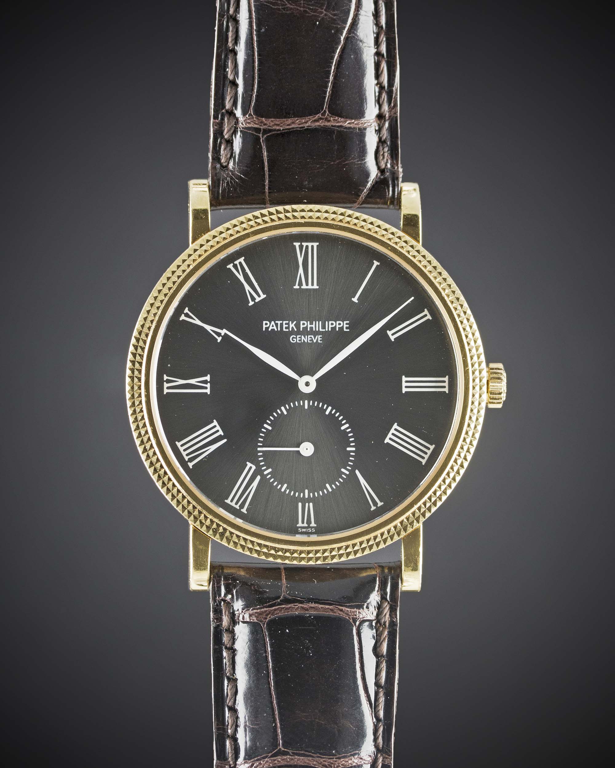 A RARE GENTLEMAN'S 18K SOLID YELLOW GOLD PATEK PHILIPPE CALATRAVA WRIST WATCH DATED 2006, REF.