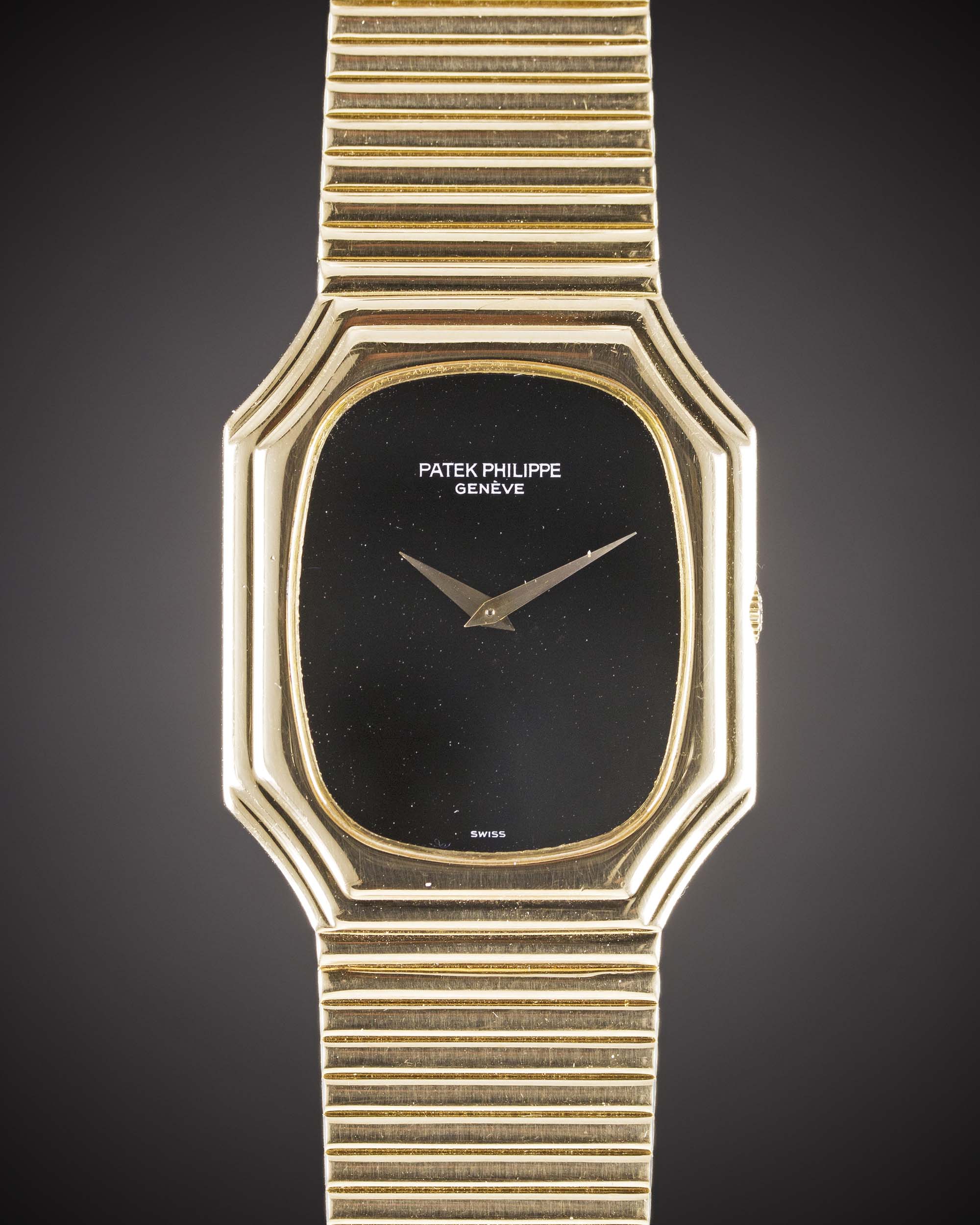 A FINE GENTLEMAN'S 18K SOLID GOLD PATEK PHILIPPE BRACELET WATCH CIRCA 1970s, REF. 3729/1 WITH ONYX