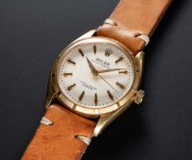 A RARE GENTLEMAN'S 18K SOLID GOLD ROLEX OYSTER PERPETUAL WRIST WATCH CIRCA 1956, REF. 6565 WITH 