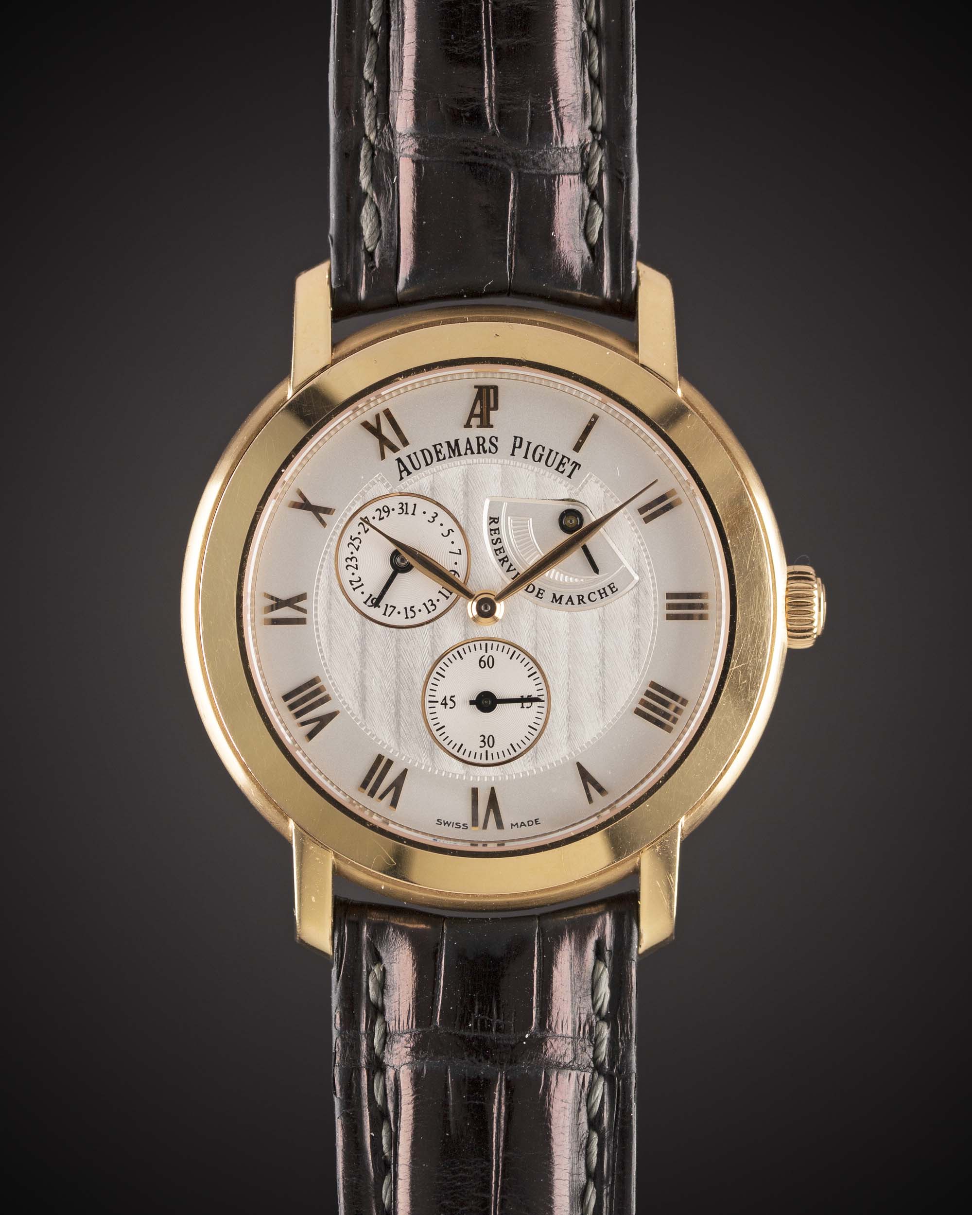 A GENTLEMAN'S 18K SOLID ROSE GOLD AUDEMARS PIGUET "JULES AUDEMARS COLLECTION" POWER RESERVE CALENDAR
