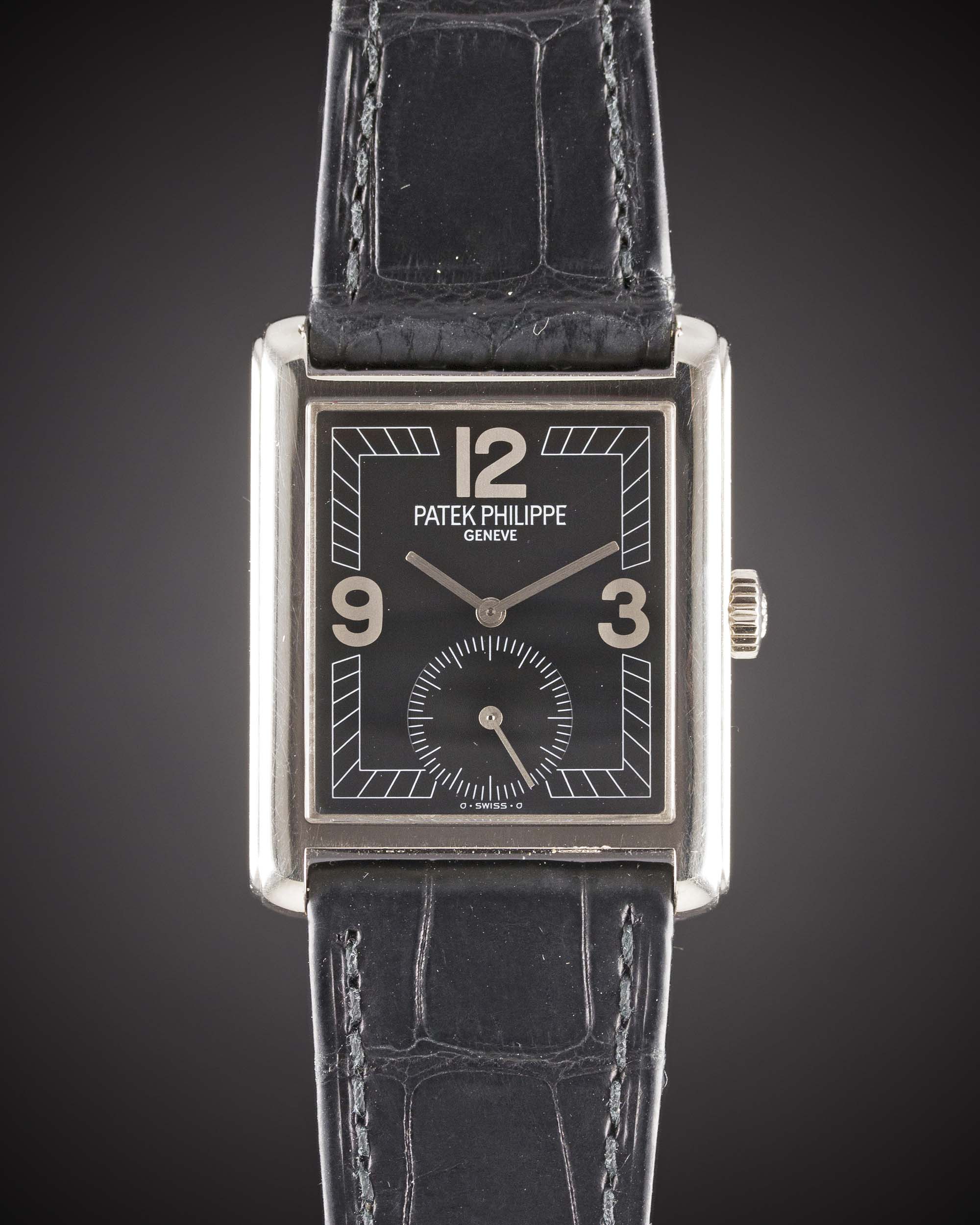 A GENTLEMAN'S 18K SOLID WHITE GOLD PATEK PHILIPPE GONDOLO WRIST WATCH CIRCA 1996, REF. 5014 WITH