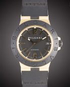 A GENTLEMAN'S SIZE 18K SOLID GOLD, TITANIUM & RUBBER BULGARI DIAGONO AUTOMATIC WRIST WATCH CIRCA