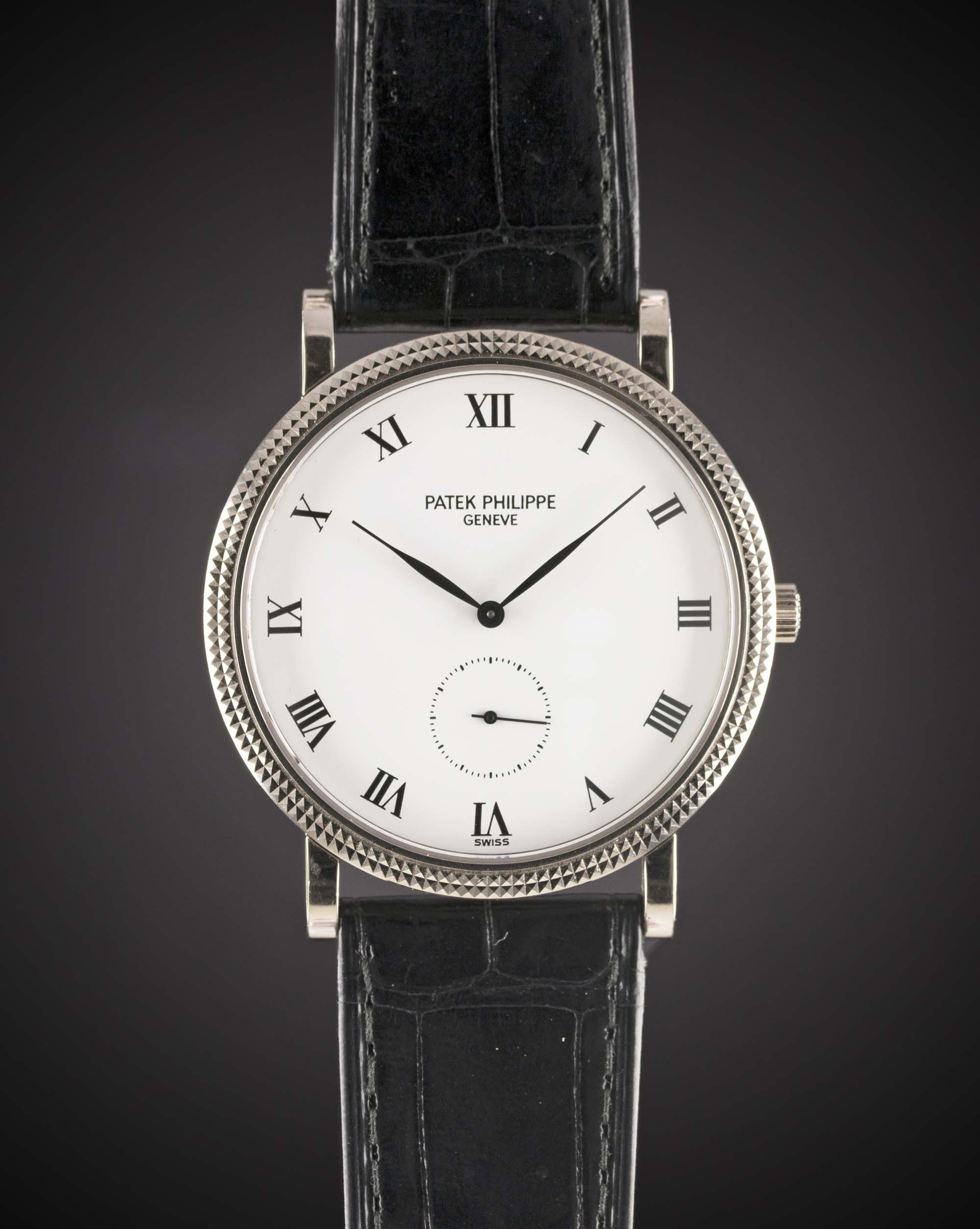 A GENTLEMAN'S 18K SOLID WHITE GOLD PATEK PHILIPPE CALATRAVA WRIST WATCH DATED 2001, REF. 3919G-001