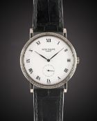 A GENTLEMAN'S 18K SOLID WHITE GOLD PATEK PHILIPPE CALATRAVA WRIST WATCH DATED 2001, REF. 3919G-001