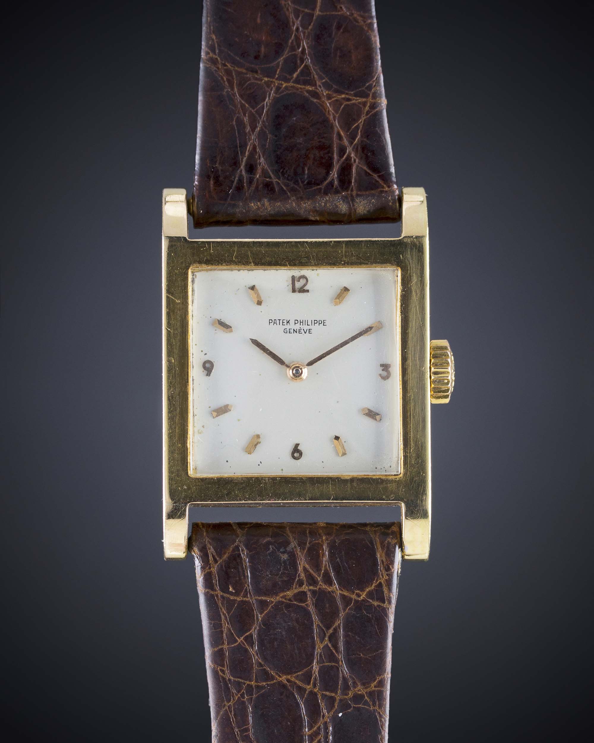 A GENTLEMAN'S 18K SOLID GOLD SQUARE CASED PATEK PHILIPPE WRIST WATCH CIRCA 1920s Movement: Manual