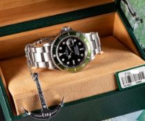 A RARE GENTLEMAN'S STAINLESS STEEL ROLEX OYSTER PERPETUAL DATE 