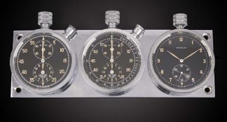 A VERY RARE HEUER AUTAVIA HERVUE TRIPLE DASHBOARD SET CIRCA 1950, WITH GLOSS BLACK DIALS Movement: