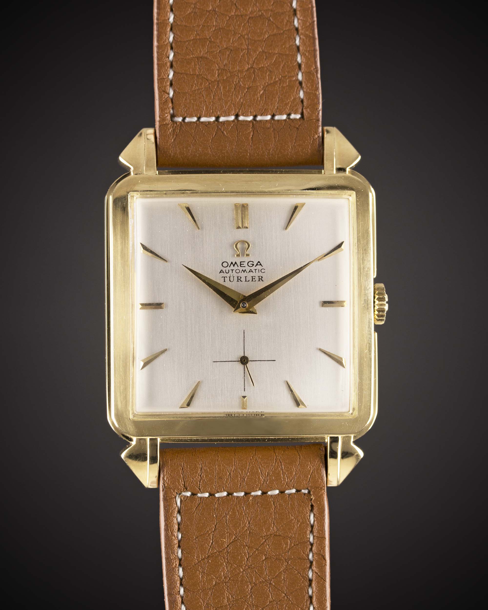 A GENTLEMAN'S 18K SOLID GOLD OMEGA "CIOCCOLATONE" AUTOMATIC WRIST WATCH CIRCA 1947, ORIGINALLY