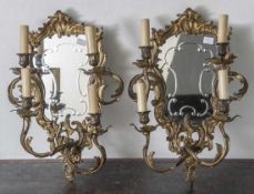 Paar Wandgirandolen, je 4-flammig (elektr.), im Stil des Rokoko, feiner Bronzeguss,feuervergoldet,