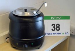 A BUFFALO Electric Soup Kettle with a Ladle