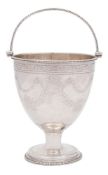 A George III silver swing handle pail, maker's mark worn, London, 1778: with beaded rim and handle,