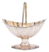 A George III silver pedestal swing handle basket, maker TG, London, 1792: initialled,