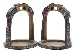 A pair of Chinese bronze and champlevé enamel stirrups: decorated with fish,