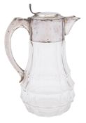 A German clear glass and silver mounted claret jug: stamped marks,