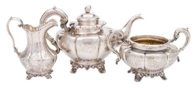 A Victorian silver three-piece tea service, maker William Hunter,