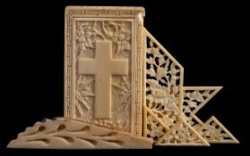 A 19th century Chinese export ivory tangram puzzle: contained in a rectangular case,