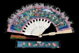 A late 19th century Cantonese fan: the paper leaf decorated with figures in a pagoda landscape each