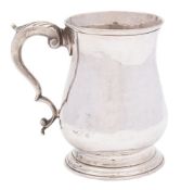 A George III silver mug, maker's mark worn, London, 1764: crested,