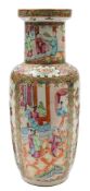 A Canton famille rose rouleau vase: painted with panels of figures on pagoda terraces and brightly
