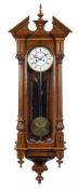 Gustav Becker, Germany, a walnut 'Vienna' regulator wall clock: the eight-day duration,