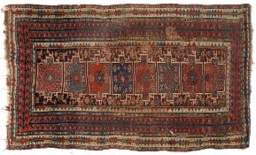 A Shirvan rug:, the field with eight rectangular panels,