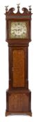 Fearnly, Wigan an oak longcase clock: the eight-day duration movement striking the hours on a bell,