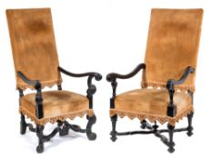 Two similar ebonised open armchairs ( NOT a pair ) in the William and Mary taste:,