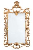 A 19th Century carved giltwood mirror:, of cartouche shaped outline, with palmette,