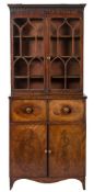 An early 19th Century mahogany and inlaid secretaire bookcase:,