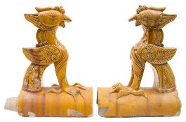 A pair of Chinese yellow glazed stoneware ridge tiles: in the Ming manner,