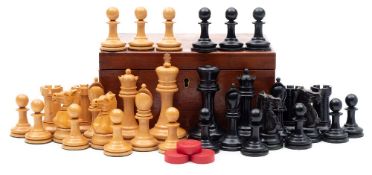 A Jaques Staunton pattern boxwood and ebony weighted chess set: the white king stamped Jaques,