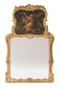 A 19th Century carved giltwood and gesso pier mirror in the Rococo taste:,