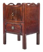 A George III mahogany and inlaid tray top commode:, the shaped gallery with carrying handles,