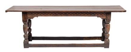 A 17th Century and later oak refectory table:,