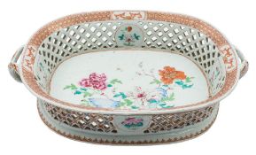 A large Chinese export famille rose basket: with pierced lattice sides and branch handles,