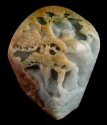 A Chinese carved jade boulder: in the form of a mountain village, a scholar and pine trees below,