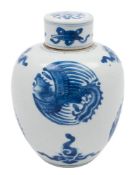 A Chinese blue and white jar and cover: of globular form with cylindrical flattened cover,