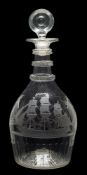 An Irish engraved glass decanter: with triple neck rings and basal comb flutes,